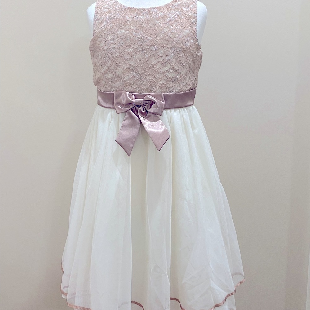 A brown and white dress, good condition.